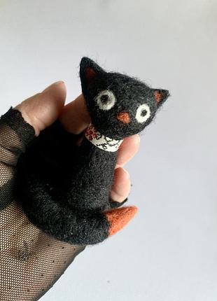 Киця гандзя, дармовис дизайнерський