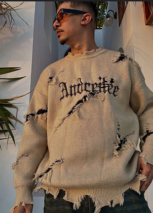 Стильний светр в стислі грандж