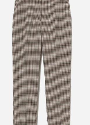 Штани в клітинах