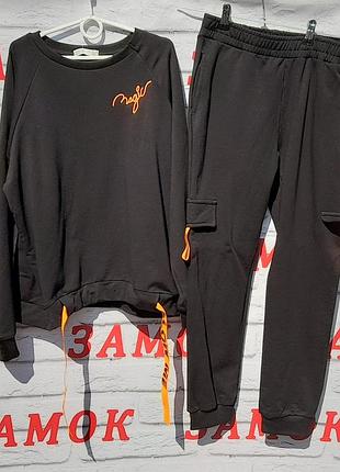 Спортивний чорний костюм 164