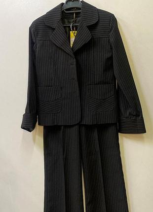 Костюм брючный на девочку 116-152 размер 140