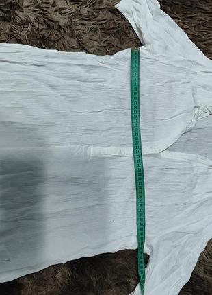 Подовжена білосніжна блуза з натуральної тканини