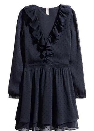 Темно-синя сукня з воланами