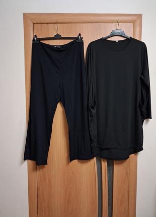 Гарний костюм штани і туніка з кишенями розмір 22-24