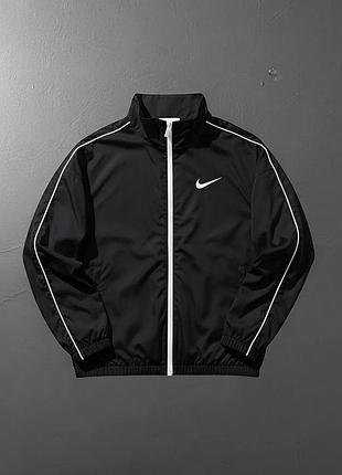 Чоловіча вітровка nike в чорному кольорі