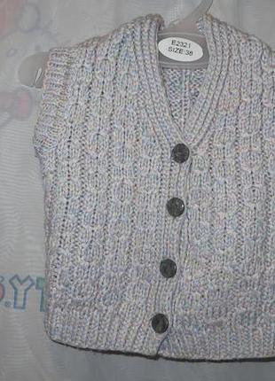 Жилетка (безрукавка) тепла вязана