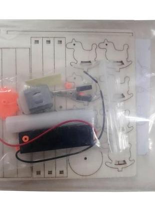 Нова дитяча іграшка та забавка. іграшковий набір - атракціон. дерев'яний конструктор із власним моторчиком 2