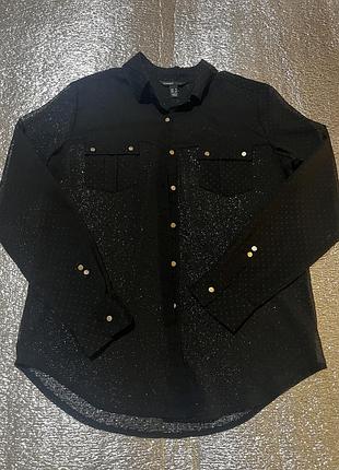 Стильна жіноча сорочка (блуза) від бренду mango (лінійка casual), яка поєднує в собі елементи класичного та вечірнього стилів.