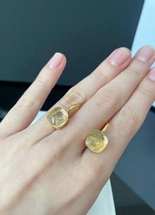 Помеллато/pomellato сережки позолота з одним квадратним каменем кольору шампанського