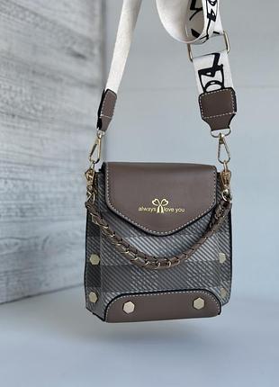 Сумочка для телефону в стилі guess