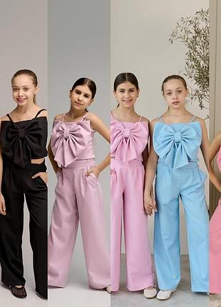 Дитячий святковий костюм для дівчинки 116-152 см у різних кольорах з бантом 152