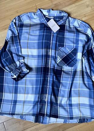 Натуральна,блакитна сорочка в клітинку