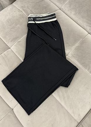 Женские трикотажные брюки палаццо