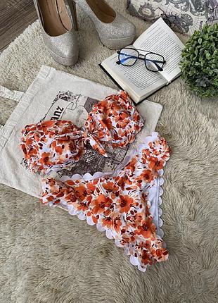 Роздільний купальник із квітковим принтом