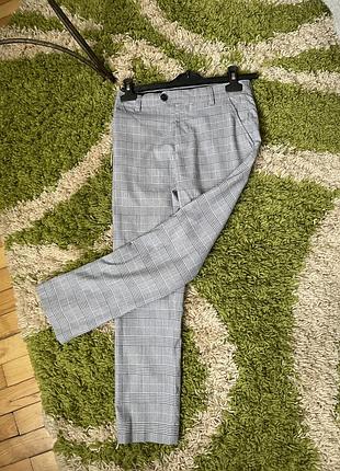 Брюки next для дівчинки в клітинку 11 р. 2