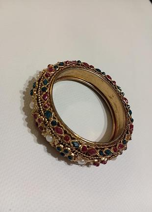 Индийский браслет из золотистого металла