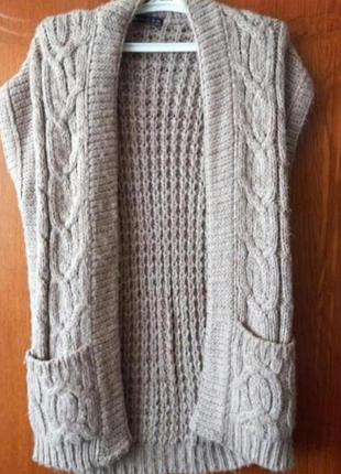 Вязаная желетка