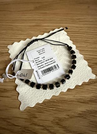 Браслет із ониксом та 585 золота.