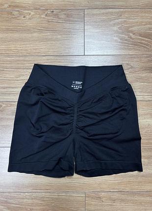 Жіночі спортивні шорти-велосипедки з push-up ефектом та трикутним вирізом ззаду