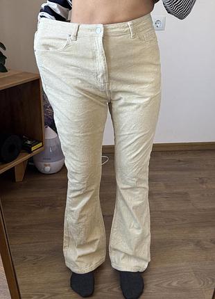 Жіночі вельветові брюки кльош ніжно жовтого кольору розмір l 40/42