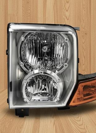 Фара основная левая jeep commander (wh), 09.05-09.10