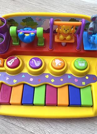 Дитяче піаніно звірята на гойдалці