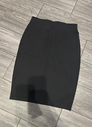 Приталена міді спідниці трикотаж