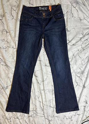 Жіночі джинси кльош