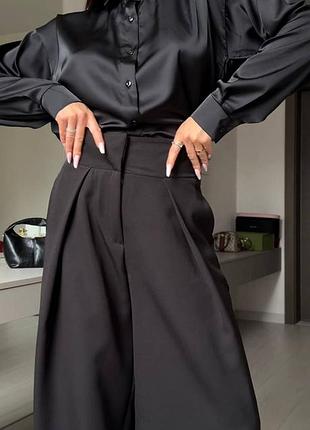 Стильні широкі брюки з високою посадкою та акуратними складками