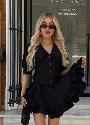 Костюм блуза на пуговицах с завязками сзади с короткой юбкой солнце с рюшами