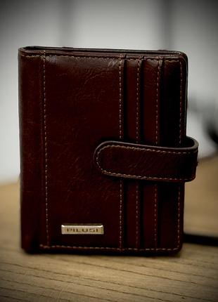 Чоловічий вмісткий гаманець з екошкіри на кнопці