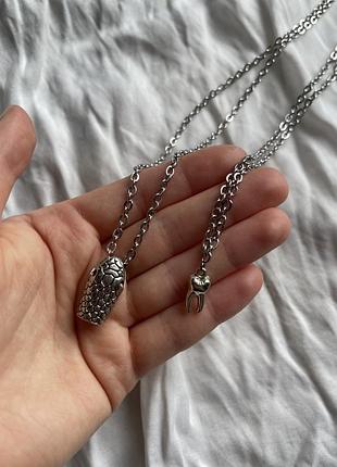 Набір ланцюжків з кулонами змія зуб