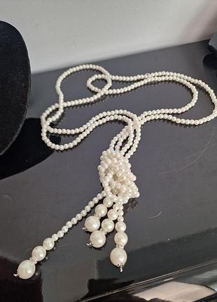 Довгі перлинні намистини в стилі «великого гітсбі» (art deco)