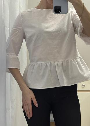 Біла жіноча блуза