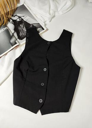 Жилетка чорна на гудзиках зара