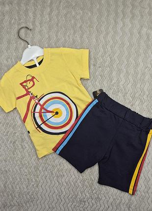 Яскравий літній комплект для хлопчика (жовта футболка з велосипедом та шорти)
