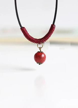 Прикраса шнурок з керамічною намистинкою