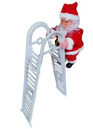 Іграшка санта-клаус, на сходах / новорічна іграшка