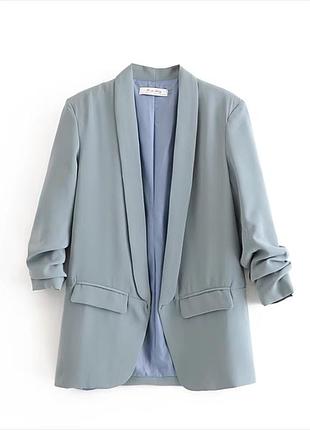 Блакитний жіночий піджак