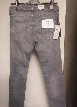 Джинсы мужские, известного бренда jack jones. суперстрейч, серого цвета, в поясе 74см