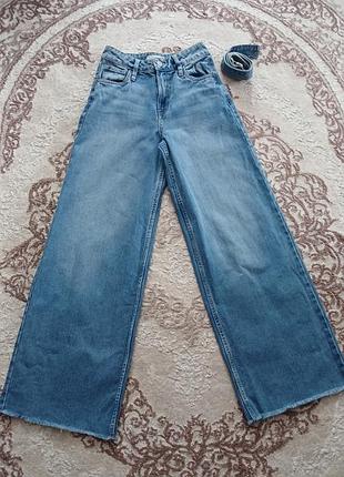 Джинси кльош