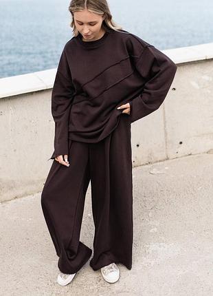 Елегантний жіночий комплект двійка оверсайз крою кофта з акцентними зовнішніми швами подовжена та штани палаццо на резинці