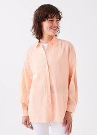 Дуже тонка, ніжна. ,подовжена бавовняна.   сорочка.   оранжевого кольору з прошвою .