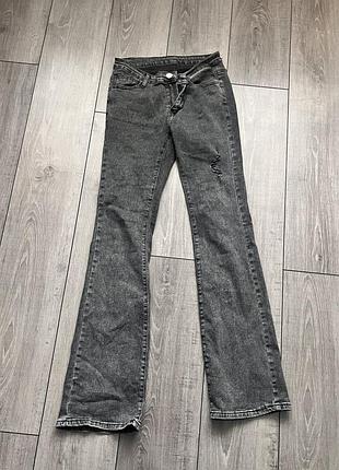 Джинсы клеш