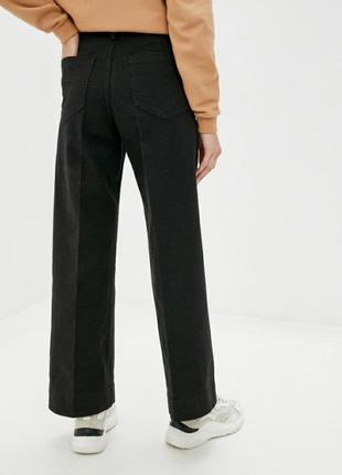 Черные джинсы расклешенные gap