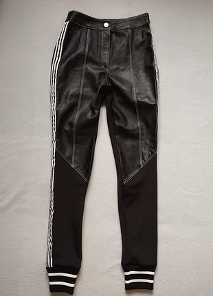 Мегакруті фірмові штани з манжетами та лампасами декоровані вставками натуральної шкіри tenax італія