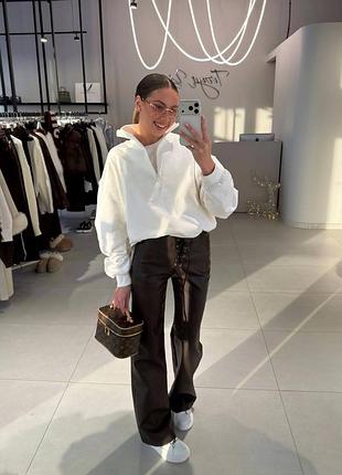 Трендові брюки з еко шкіри на високій посадці з корсетною зав’язкою