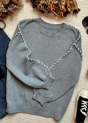 Тепла подовжена кофта в ніжно-блакитному кольорі вільного крою