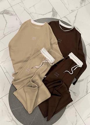 Повсякденний жіночий спортивний костюм вільного крою світшот з вишивкою «miumiu» та штани палаццо на шнурку