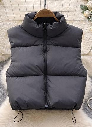 Женская жилетка